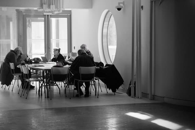 A working group gathered around a table